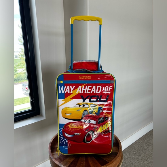 American Tourister Other - Pixar CARS Luggage with retractable handle.Good Condition. SZ. 24” X 18”.